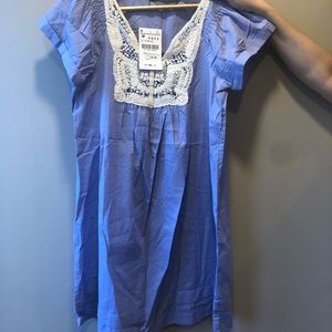 Short dress with crochet trimming brand new